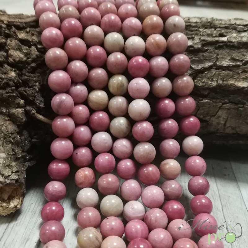 Rhodonite rose naturelle en perles rondes 8mm - fil complet Rhodonite rose naturelle en perles rondes 8mm - fil complet