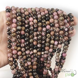 Rhodonite rose et noire en perles rondes 6mm - fil complet