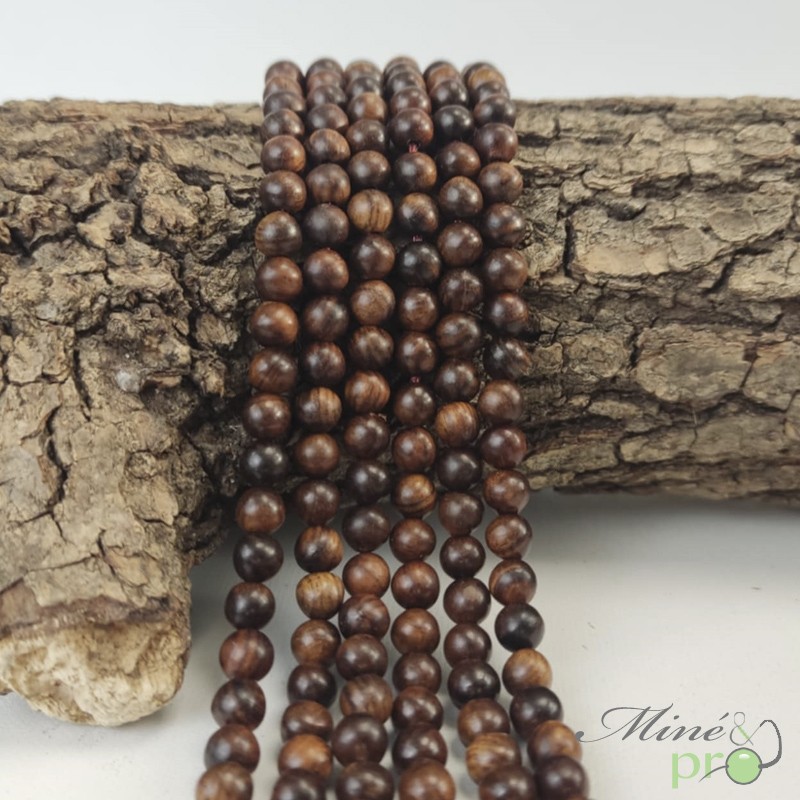Bois brun en perles rondes 6mm - fil complet Bois brun en perles rondes 6mm - fil complet
