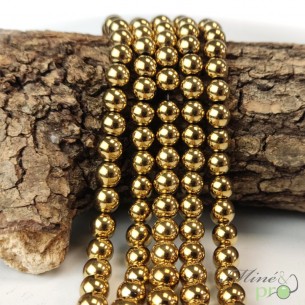Hématite dorée A en perles rondes 8mm - fil complet