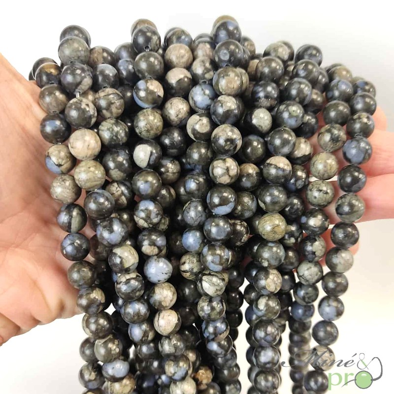 Que sera en perles rondes 8mm - fil complet
