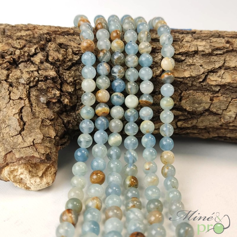 Calcite bleue marbrée A+ en perles rondes 6mm - fil complet
