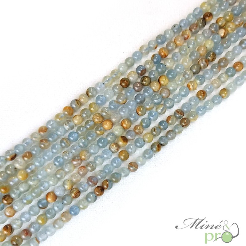 Calcite bleue marbrée A+ en perles rondes 4mm - fil complet