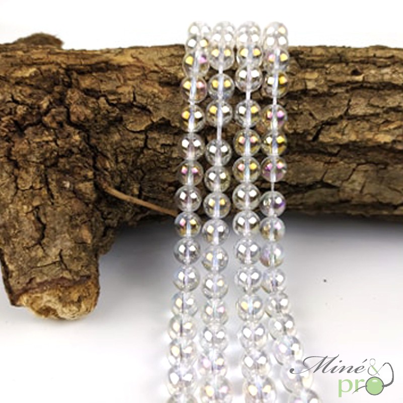 Aqua aura quartz blanche en perles rondes 8mm - fil complet Aqua aura quartz blanche en perles rondes 8mm - fil complet