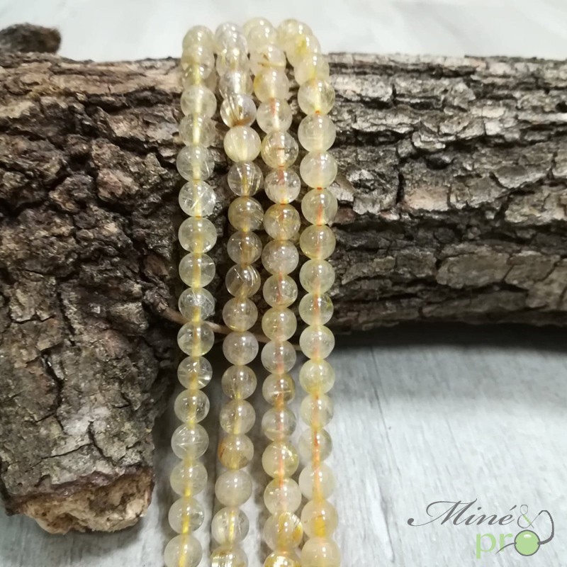 Quartz rutile naturel en perles rondes 6mm - fil complet Quartz rutile naturel en perles rondes 6mm - fil complet