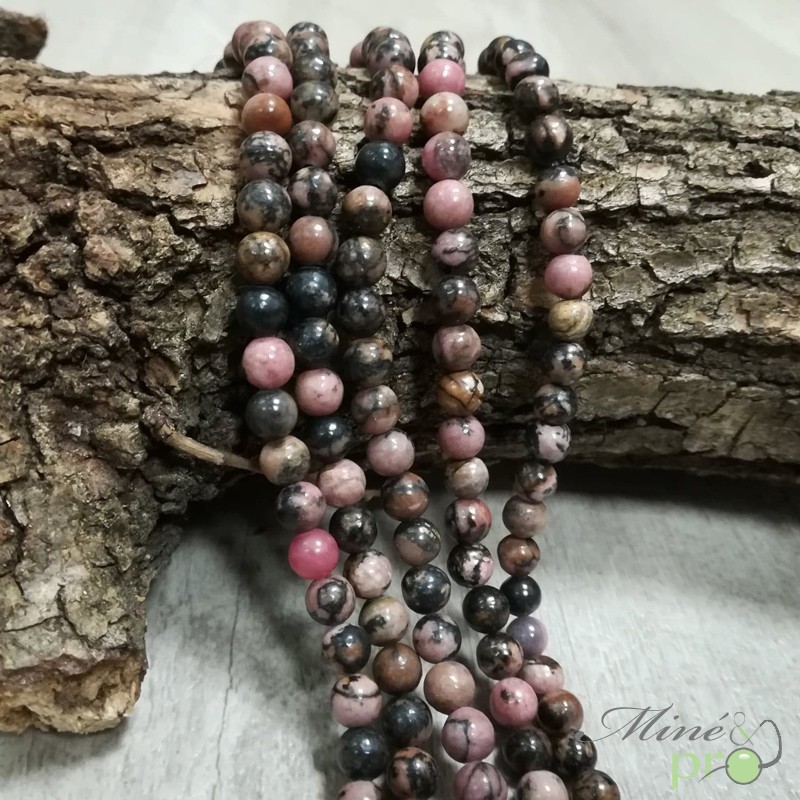 Rhodonite rose et noire naturelle en perles rondes 6mm - fil complet Rhodonite rose et noire naturelle en perles rondes 6mm - fil complet