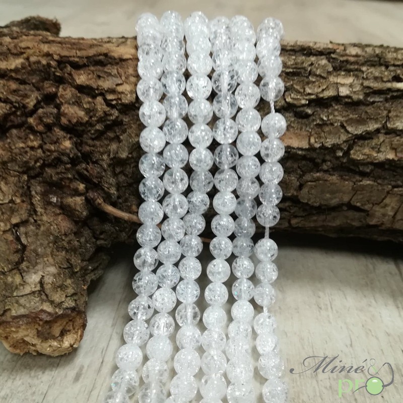 Cristal de roche craquelé en perles rondes 6mm - fil complet Cristal de roche craquelé en perles rondes 6mm - fil complet