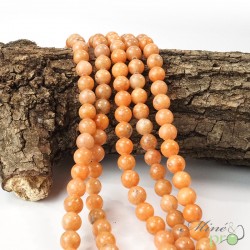 Calcite orange en perles rondes 8mm - fil complet