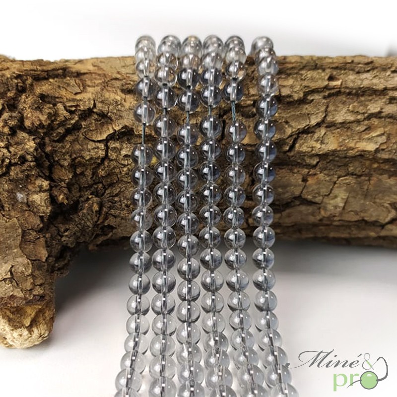 Aqua aura quartz grise en perles rondes 6mm - fil complet Aqua aura quartz grise en perles rondes 6mm - fil complet
