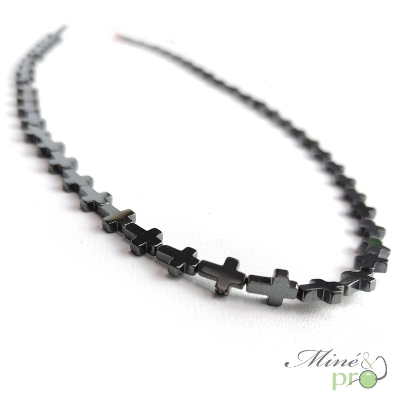 Hématite en perles plates "croix" 8mm - fil complet