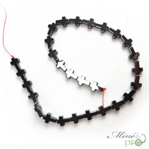 Hématite en perles plates "croix" 14mm - fil complet