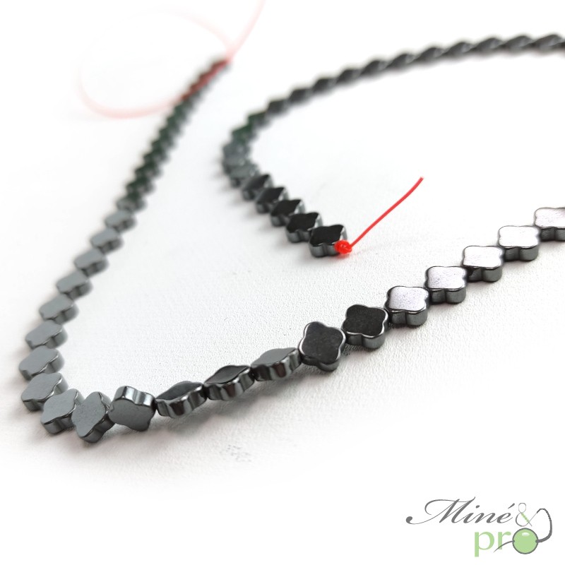 Hématite en perles plates "trèfle" 6mm - fil complet
